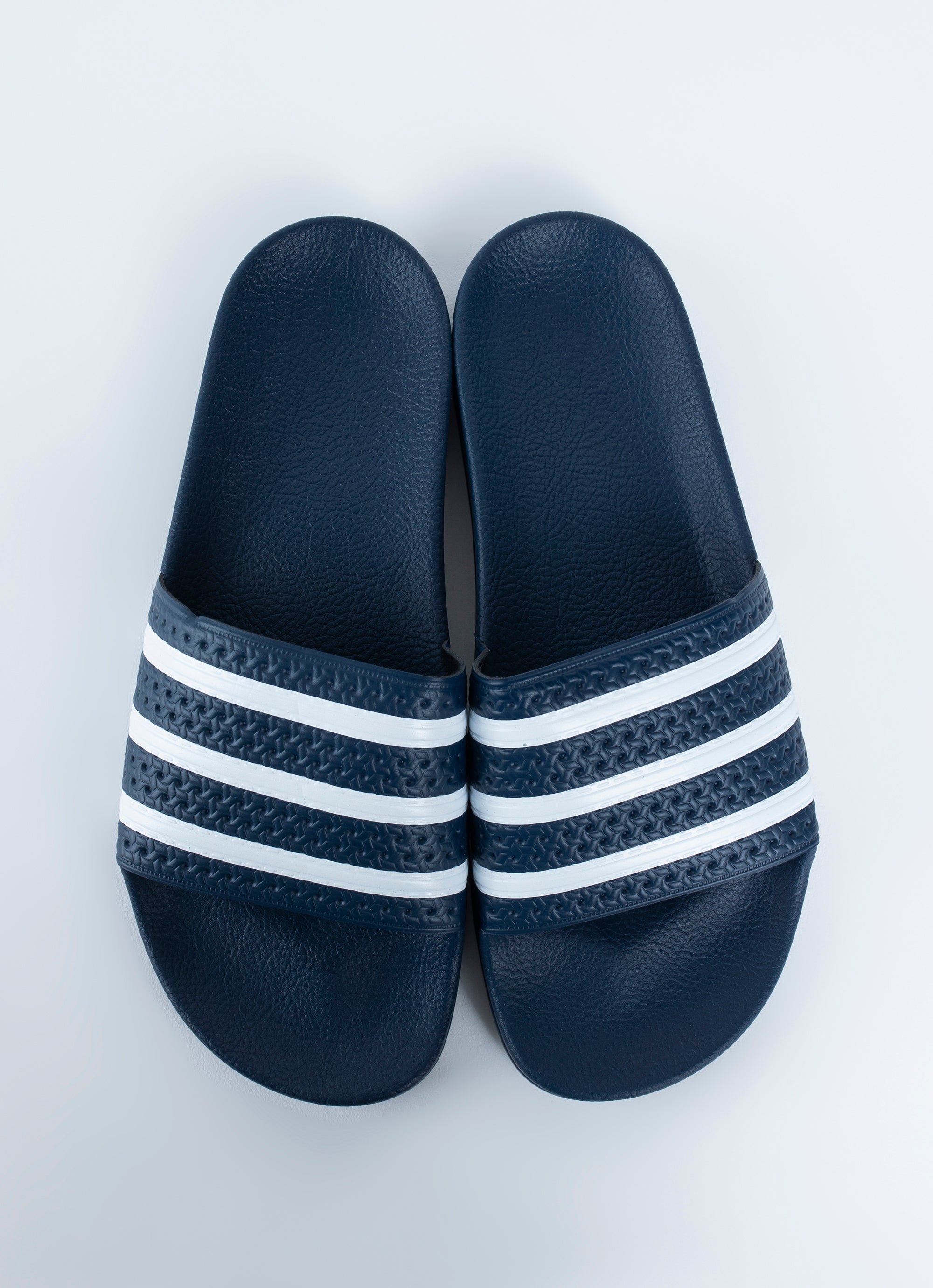 adidas slides glue store